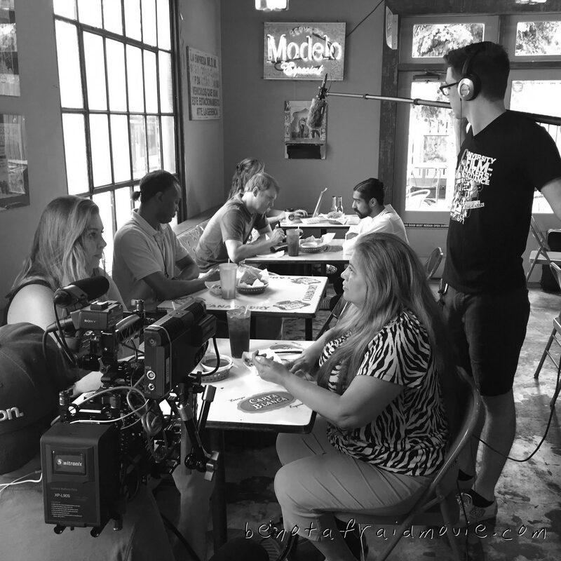Restaurant scene. Full cast at the table