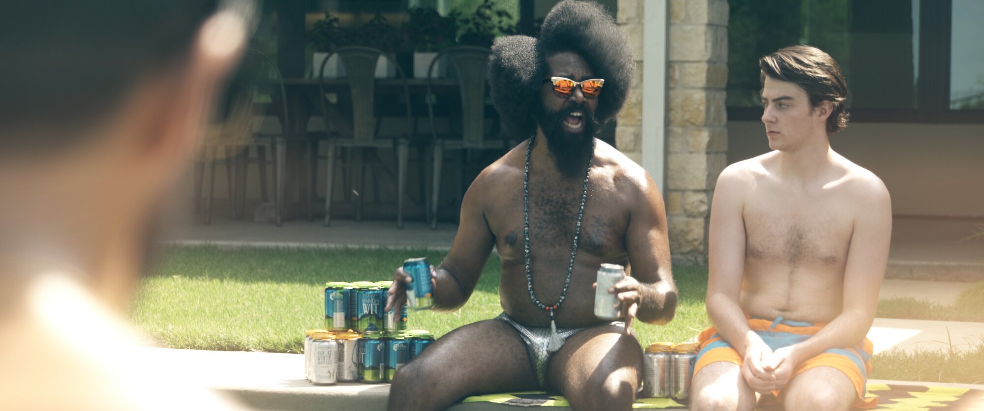 Purvis poolside with beers