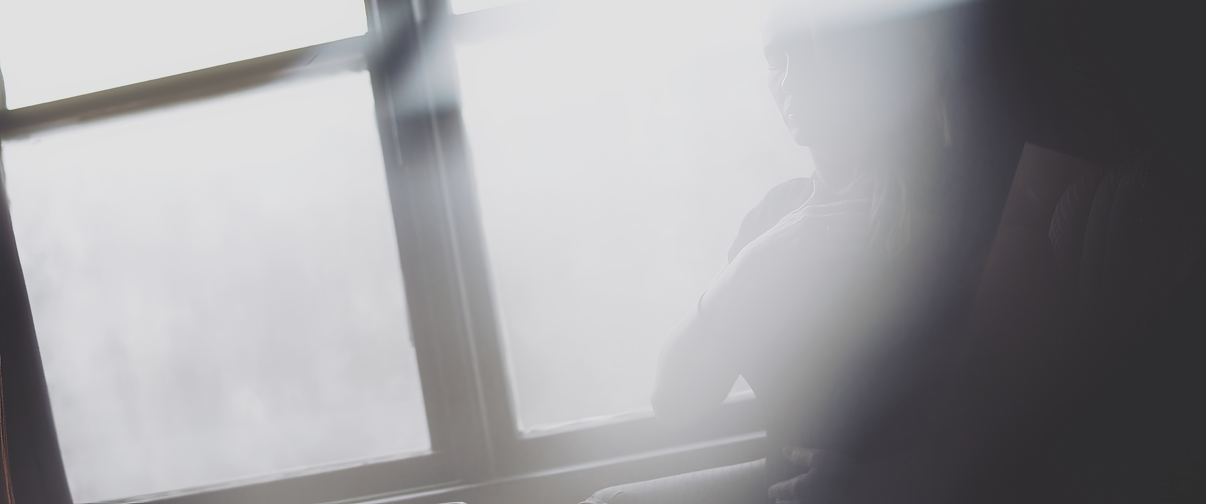 Spiritual direction. Silhouette at the window