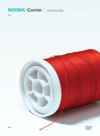 NOOMA 023 Corner. Official DVD cover art, featuring a red spool of thread on a white background.