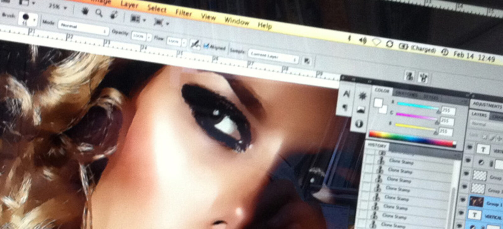Restoring imagery in Photoshop. Clone stamp process